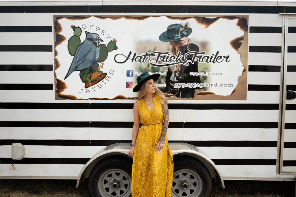 Small business boutique owners of Gypsy Jaybird wearing custom hats